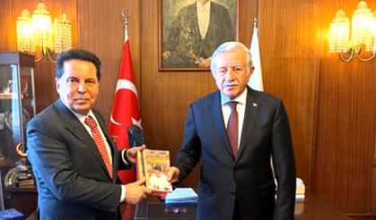 CHP'li Özer'den MHP'lilere ziyaret